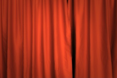 a red theater curtain. background. front view, pleasant shadows.
