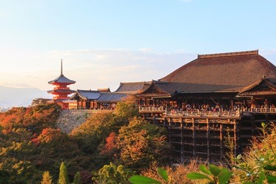 kiyomizu-dera temple in autumn on sunset sky at kyoto, japan