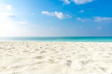 sea view from tropical beach with sunny sky. summer paradise beach website design. tropical shore. tropical sea in maldives. exotic summer beach sky clouds on horizon. ocean beach relax outdoor travel
