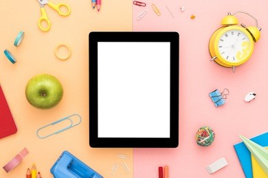 creative flat lay photo with tablet. back to school concept. office workspace. top view with copy space.
