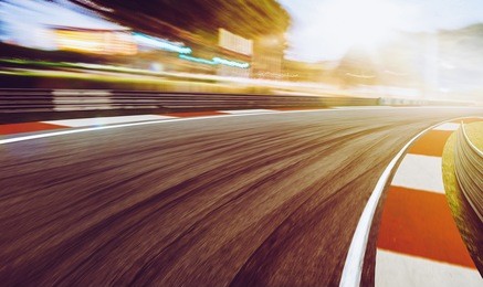 motion blurred racetrack,sunset scene