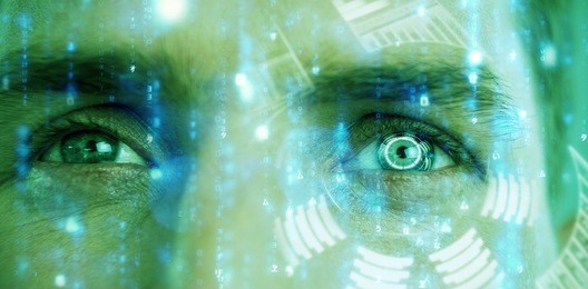 digitally generated image of volume knob with graph against close up of man eyes