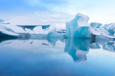 blue icebergs in glacier lagoon, jokulsarlon, iceland
