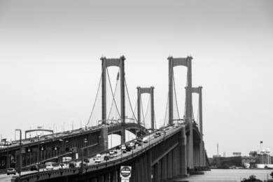 black and white photo of delaware memorial bridge between new castle and pennsville new jersey, usa