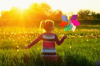 girl in the sunlight in the field