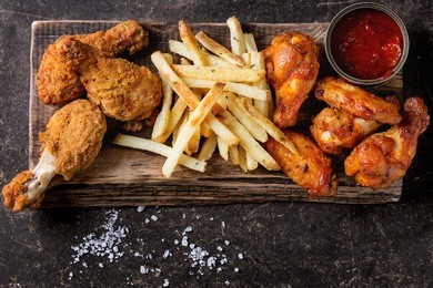 fried chicken legs with french fries
