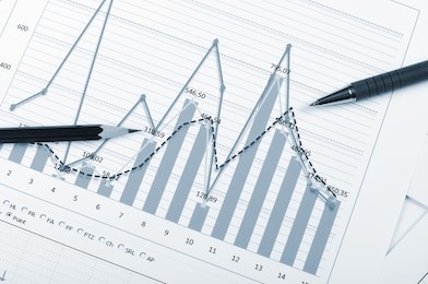 charts and graphs of sales of securities - workplace successful business man