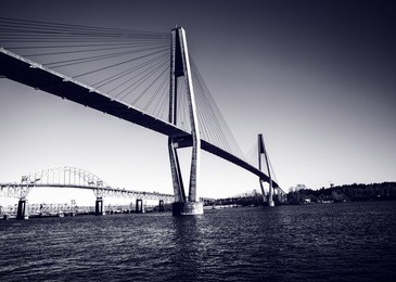 black and white image of famous port man suspension bridge at new westminster vancouver bc. 