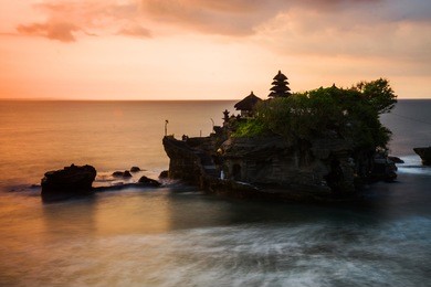 temple of tanah lot in bali at sunset