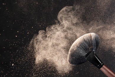 beige blusher explosion isolated on black background