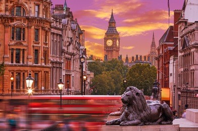 london trafalgar square lion and big ben tower at background