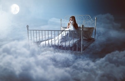 woman wakes up in the clouds
