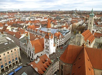 stunning view of munich cityscape with the old town hall, seen from tower of st. peter’s church, munich, bavaria, germany