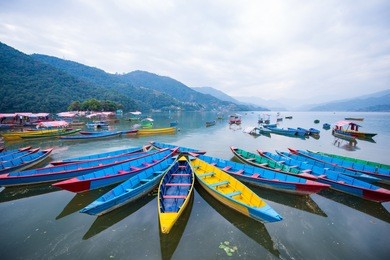 rowboat symbol of phewa lakeshore in pokhara city , nepal