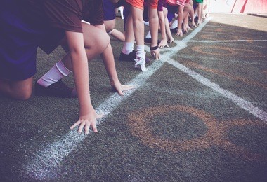students boy get set to leaving the starting for running competition boy at school sports day. school sports day concept.