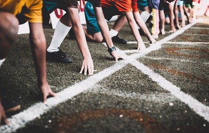 students boy get set to leaving the starting for running competition boy at school sports day. school sports day concept.