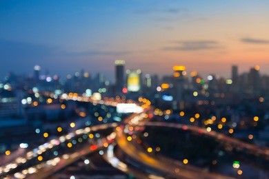 abstract blurred bokeh lights city and road intersection aerial view
