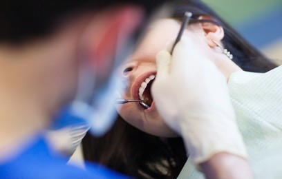 the patient at the dentist.