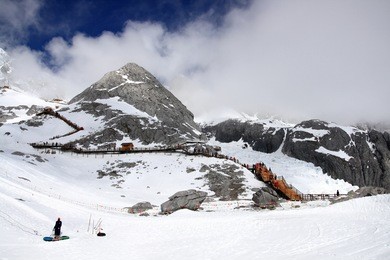 wooden stair on jade dragon snow mount, lijiang, yunnan, southern china