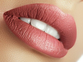 perfect natural lip makeup. close up macro photo with beautiful female mouth. plump full lips. close-up face detail. perfect clean skin, light fresh lip make-up. beautiful spa tender lip