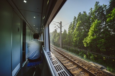 view through the train window. sunrise time. motion blur effect.