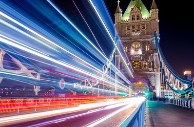 light trails along tower bridge in london