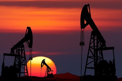 oil pumps silhouette at colorful sunset