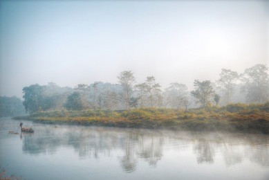 chitwan national park.  is mainly covered by jungle. canoeing on the river