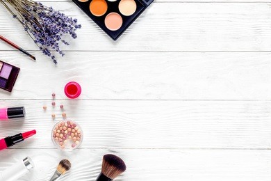 cosmetic on white table with lavender top view, mock-up