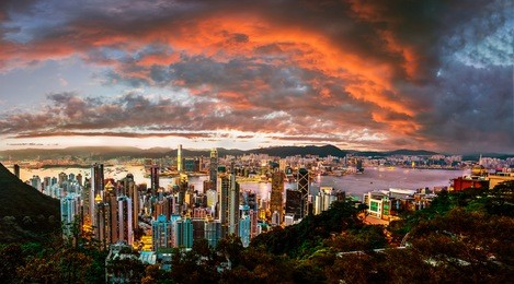 cloudy colourful sunset over the victoria bay in hong kong, china