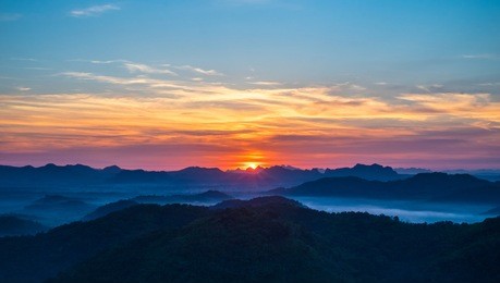 beautiful landscape of sunrise with mist, sky and cloud view from top mountain at phu bo bit, loei, thailand