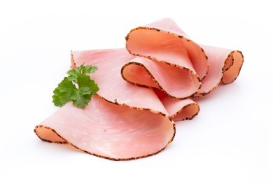 sliced boiled ham sausage isolated on white background, top view