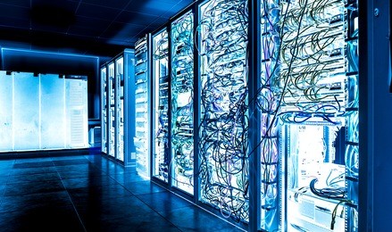 big datacenter with connected servers and internet cable infrastucture. in blue bright tones