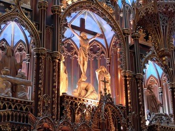 interior and exquisite details of main altar of the notre-dame basilicai in montreal, canada.