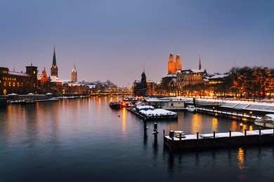 zurich, switzerland old town, situated on the limmat river. illuminated buildings in zurich, switzerland - the largest city in the country