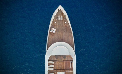 aerial close-up view of big luxury yacht in sea, copyspace for text