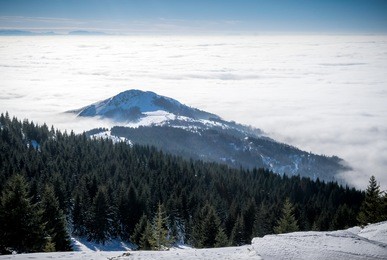 snowy mountain peak in the clouds, kopaonik, serbia
