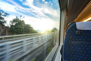 the view from the train window overlooking the sunset.
