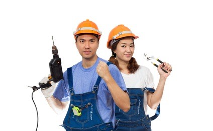 happy asian couple with repairing tools, isolated on white. home improvement, renovation set and diy concept