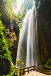 giant waterfalls in longshuixia fissure national park, wulong country, chongqing, china