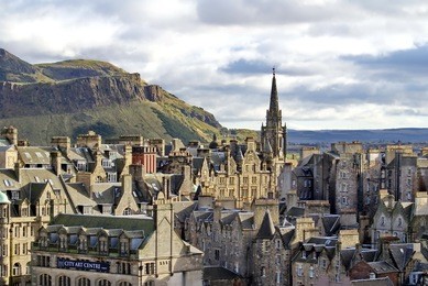 overhead view of the old town, edinburgh, scotland, with the firth of forth and a hill in the distance