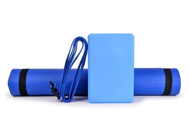 yoga blocks belts and mat props isolated on white background.
