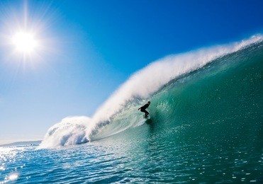 surfer getting barreled in california