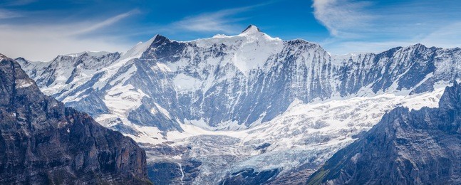 great view of the snowy massive rock in sunlight. picturesque and gorgeous scene. location place swiss alps, grindelwald valley, bernese oberland, europe. discover the world of beauty.