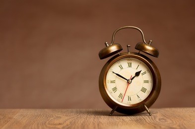 vintage alarm clock on table