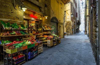 narrow cozy street with vegetable shop in florence, tuscany, italy. architecture and landmark of florence, florence cityscape