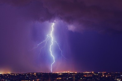 beautiful lightning above the night city