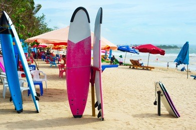 surfboards and funboards on the beach of kuta, bali island, indonesia