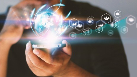 businessman using mobile smartphone. application icons interface on screen. social media concept