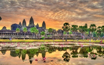 sunrise at angkor wat, a unesco world heritage site in cambodia. built in the 12th century, it is the largest religious monument in the world.